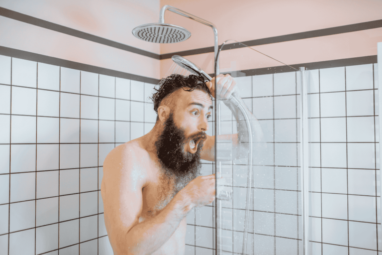 man taking cold shower