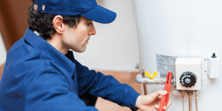 HVAC tech installing a new water heater