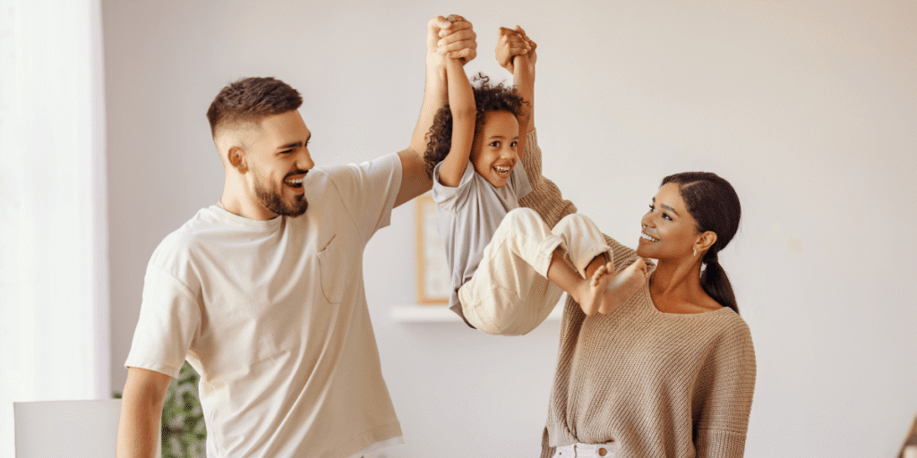 Atlanta family smiling in a comfortable home