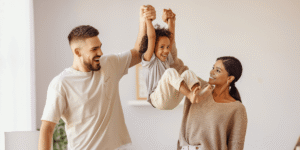 Atlanta family smiling in a comfortable home